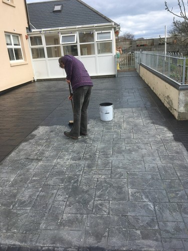 Imprinted concrete coloured