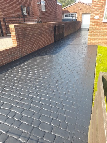 Imprinted concrete coloured