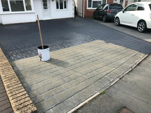 Imprinted concrete coloured
